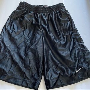 Nike basketball shorts size Medium black with white swish